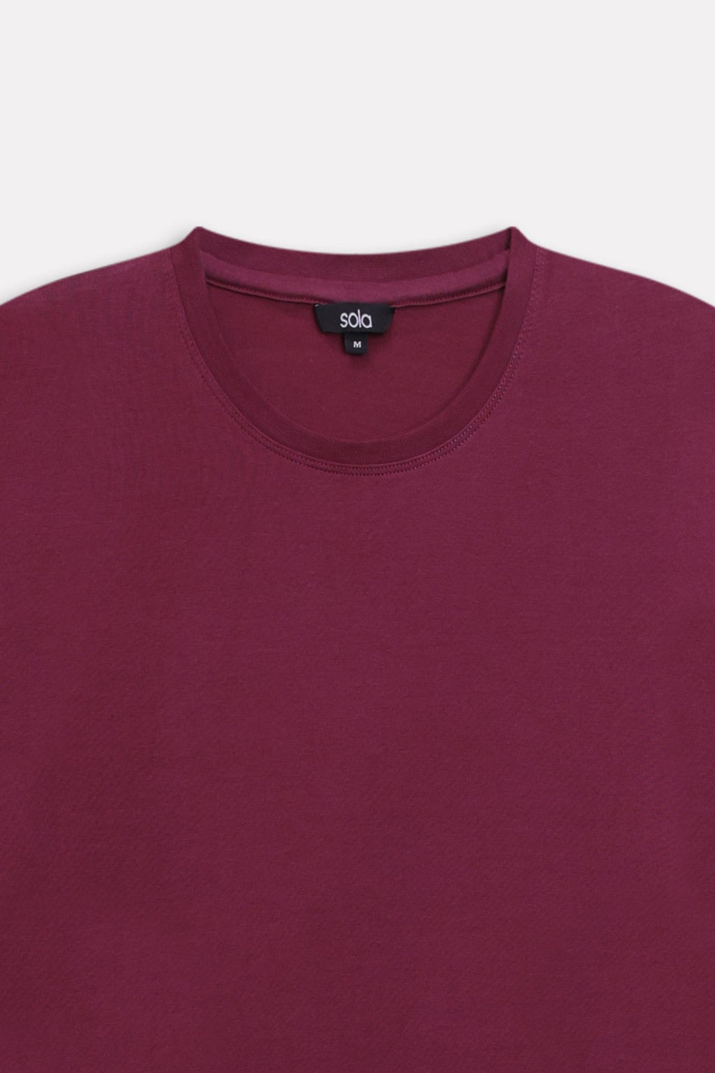 Texture and fabric detail, dark red (burgundy) regular fit crew neck t-shirt, by SOLA Pakistan.