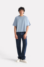 Faded blue (faded denim) drop shoulder cotton t-shirt, full styled look, by SOLA Pakistan.