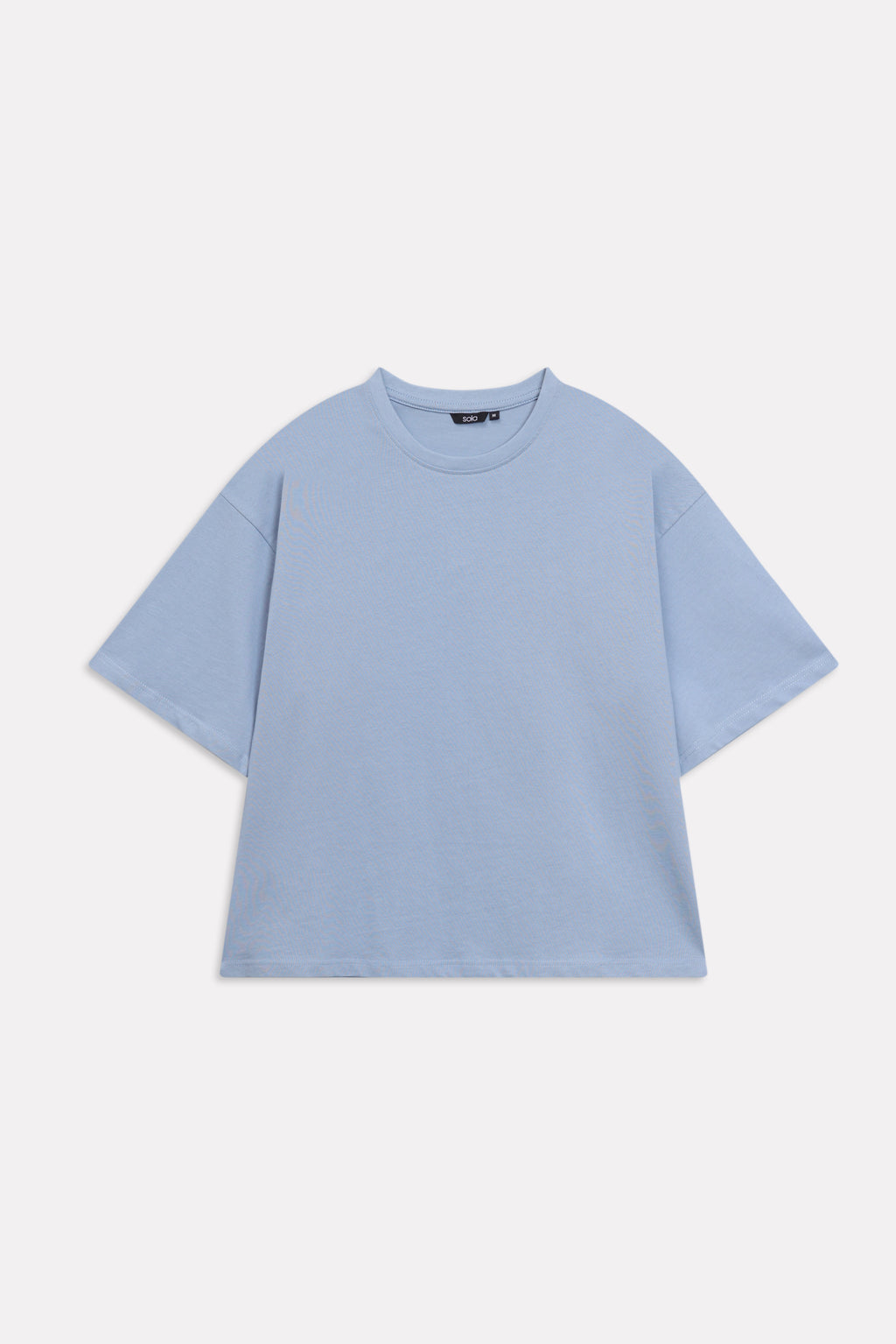Texture and fabric detail, faded blue (faded denim) drop shoulder cotton t-shirt, by SOLA Pakistan.