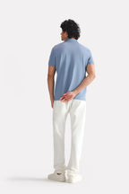 Faded blue (faded denim) micro-textured cotton pique polo, full styled look, by SOLA Pakistan.