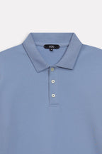 Texture and fabric detail, faded blue (faded denim) micro-textured cotton pique polo, by SOLA Pakistan.