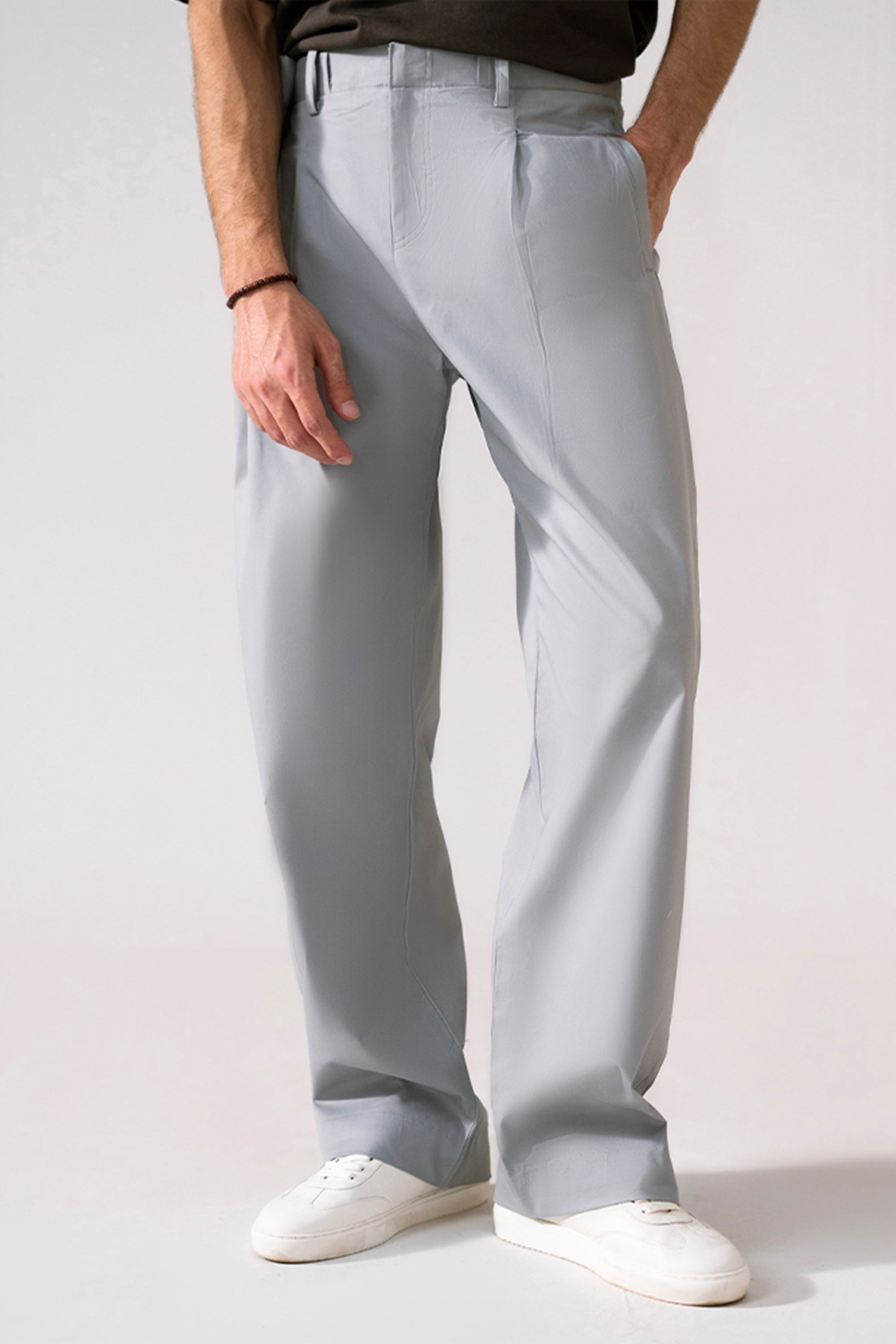 Grey barrel-leg pleated trouser, full styled look, by SOLA Pakistan.