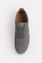 Grey essence suede trainer shown in detail, by SOLA Pakistan.