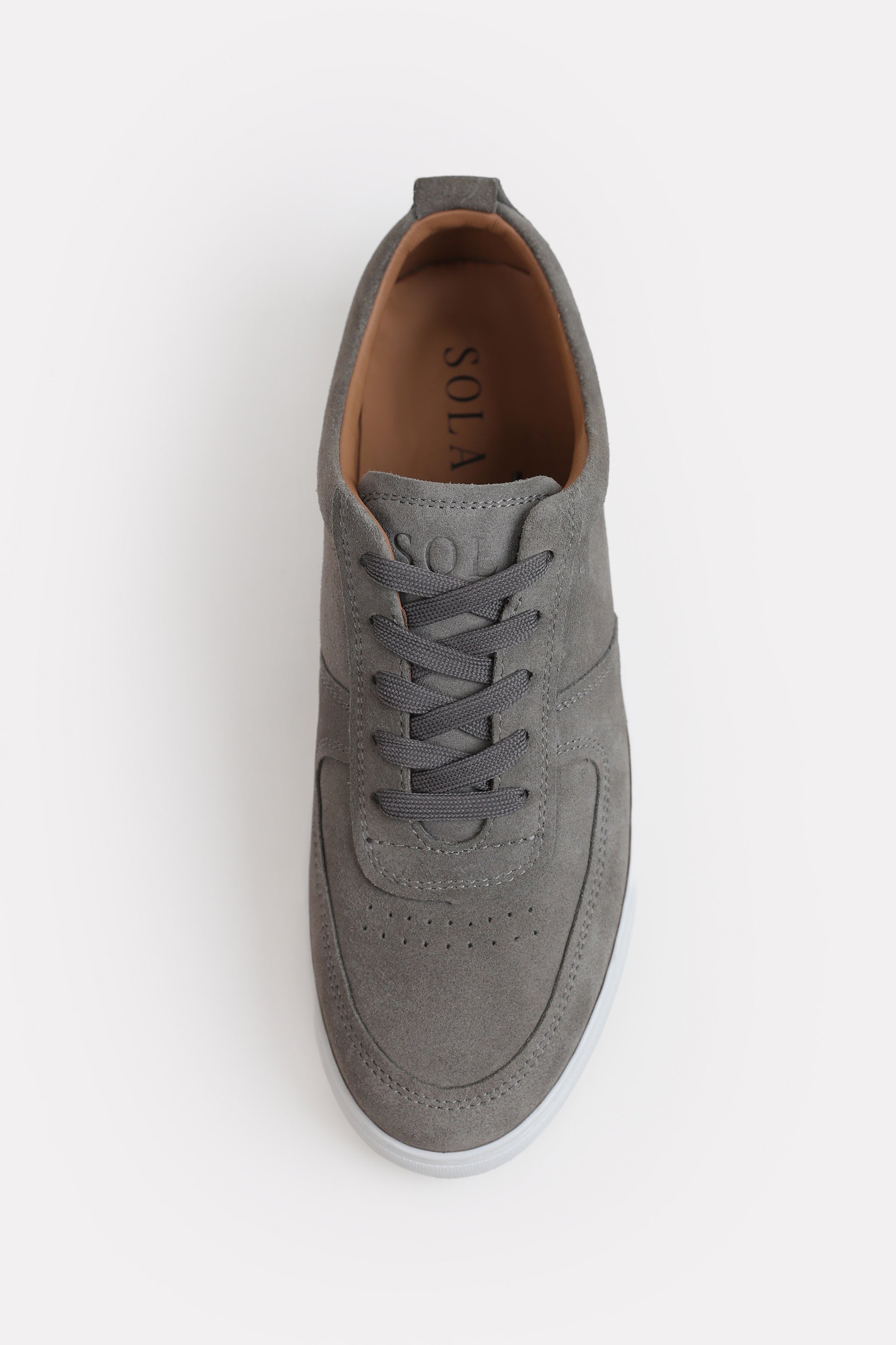 Grey essence suede trainer shown in detail, by SOLA Pakistan.