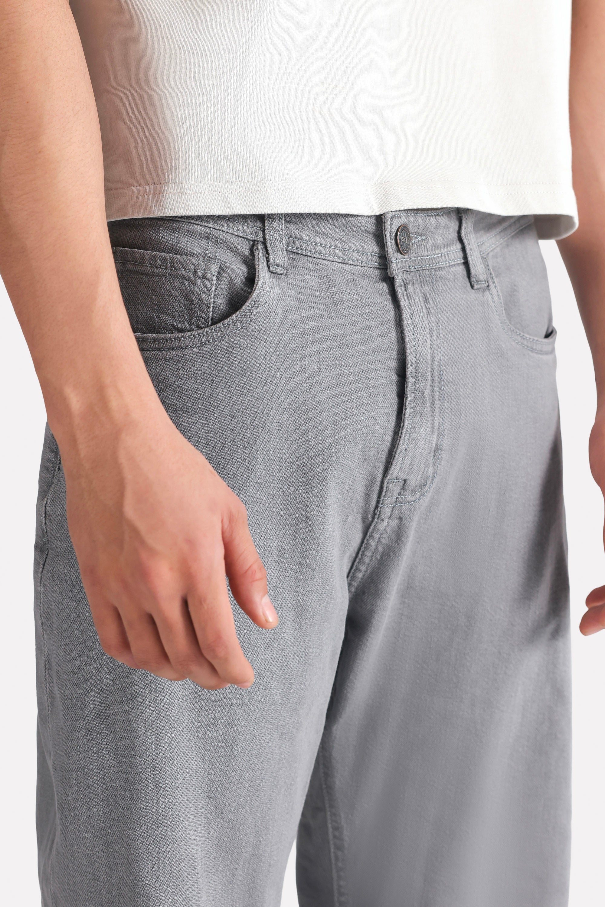 Grey regular fit jean shown in a styled fit, by SOLA Pakistan.