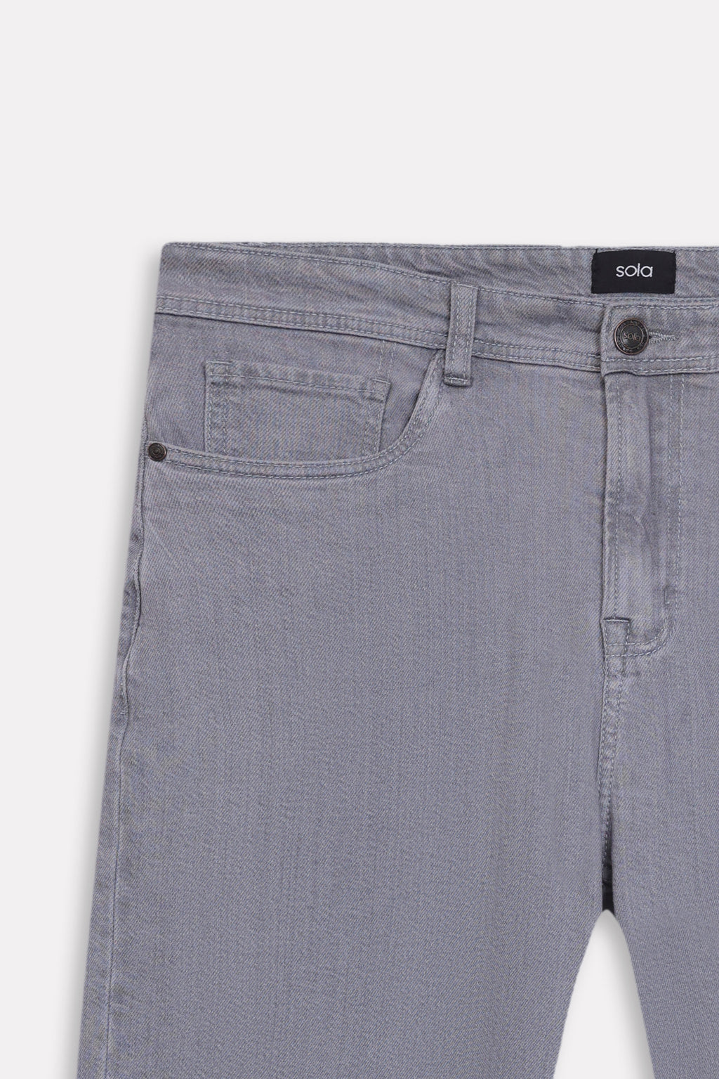 Texture and fabric detail, grey regular fit jean, by SOLA Pakistan.