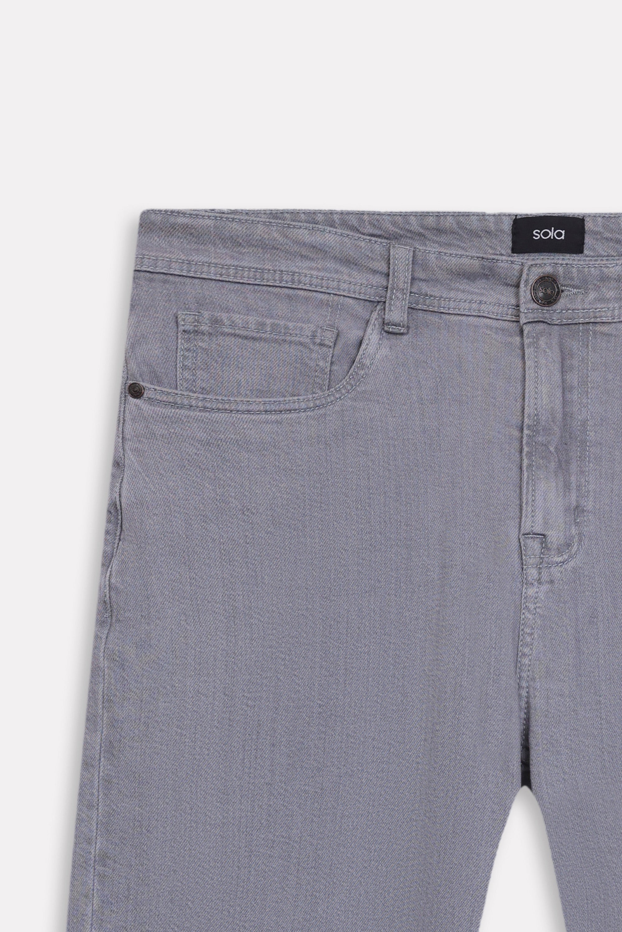 Texture and fabric detail, grey regular fit jean, by SOLA Pakistan.