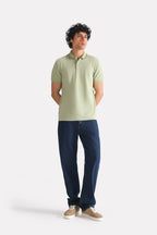 Close-up detail on the khaki beige (faded khaki) micro-textured cotton pique polo, by SOLA Pakistan.