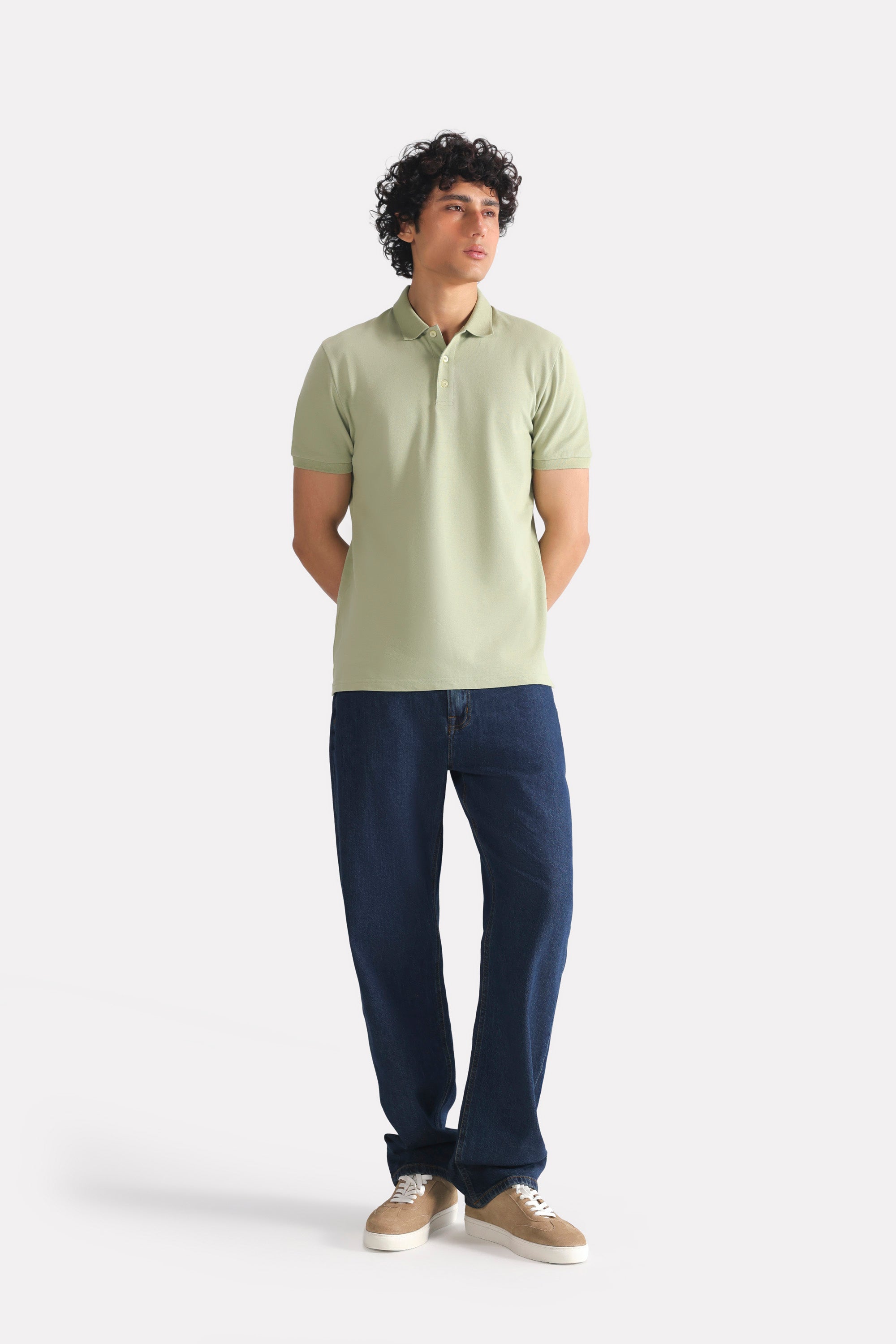 Close-up detail on the khaki beige (faded khaki) micro-textured cotton pique polo, by SOLA Pakistan.