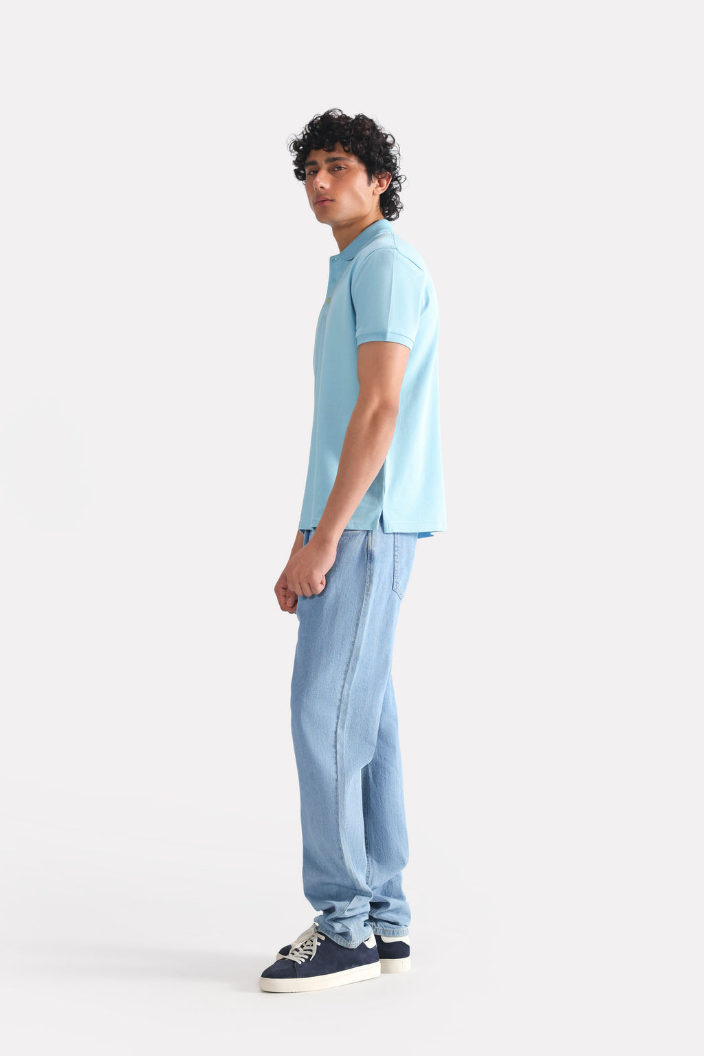 Light blue micro-textured cotton pique polo, full styled look, by SOLA Pakistan.