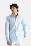 Light blue premium cotline shirt in cotton-linen blend, worn by a model, by SOLA Pakistan.