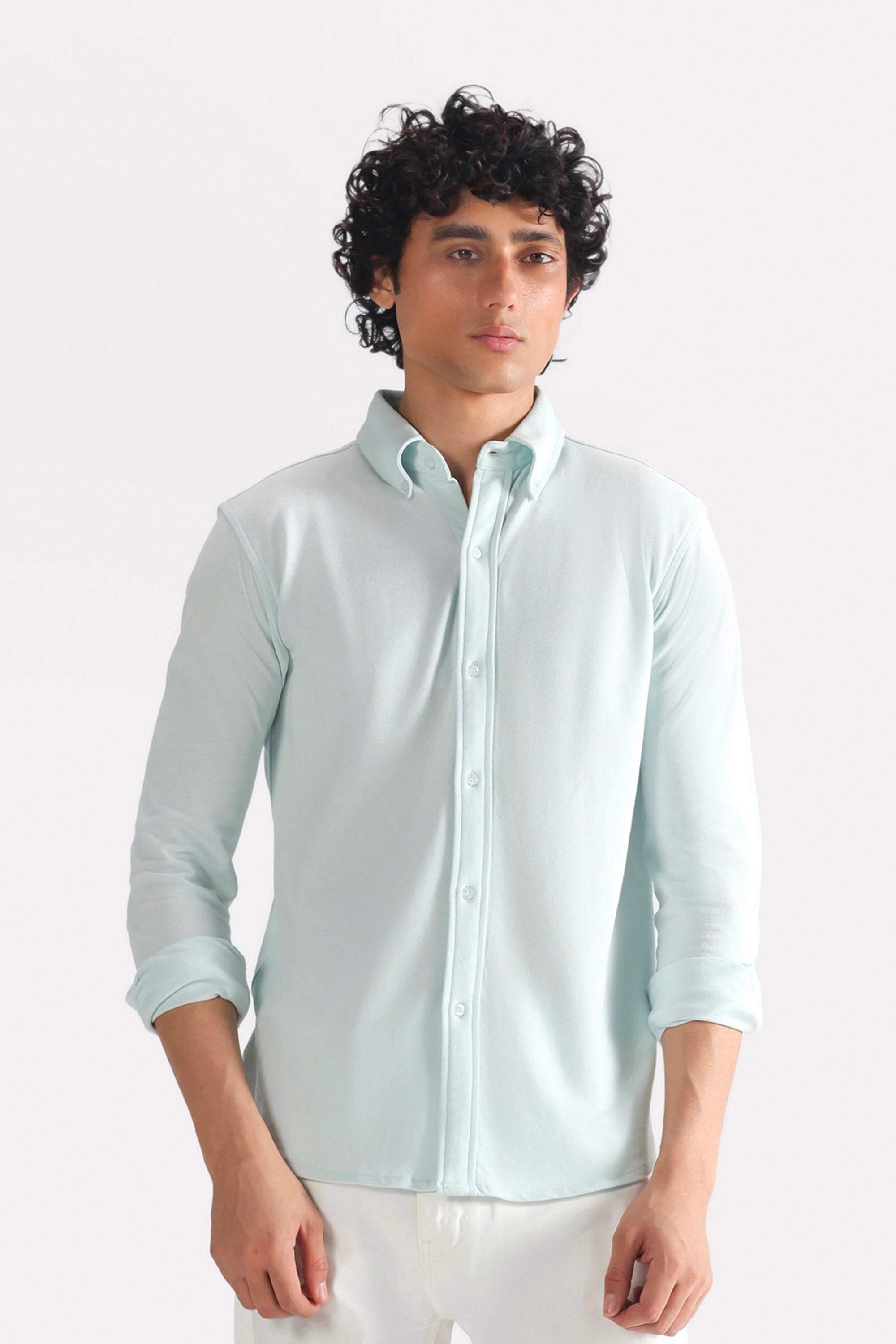 Close-up detail on the light blue regular fit pique shirt, by SOLA Pakistan.