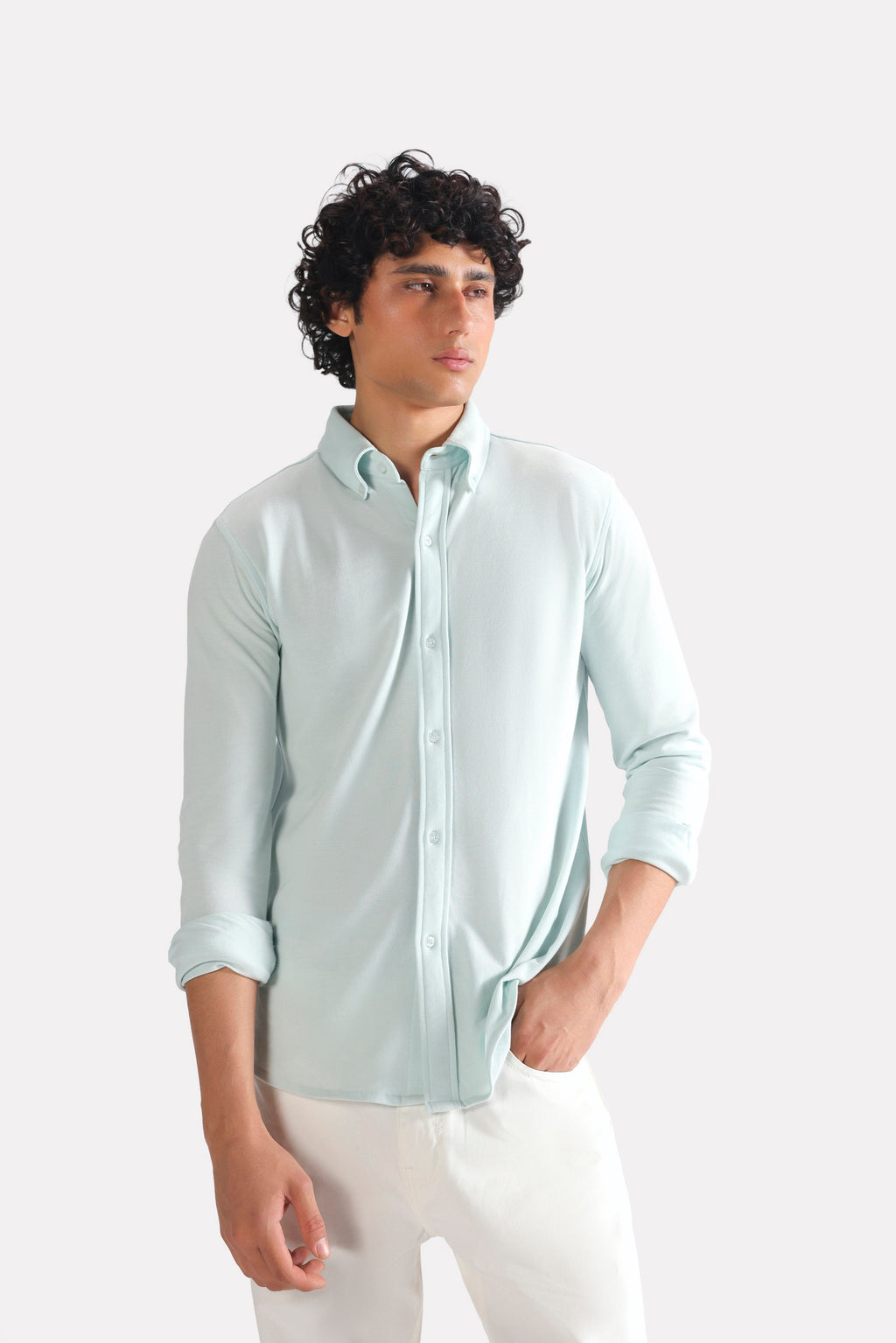 Light blue regular fit pique shirt in cotton, worn by a model, by SOLA Pakistan.