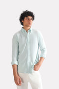 Light blue regular fit pique shirt in cotton, worn by a model, by SOLA Pakistan.