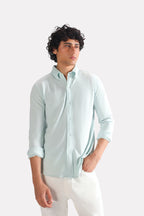 Light blue regular fit pique shirt in cotton, worn by a model, by SOLA Pakistan.