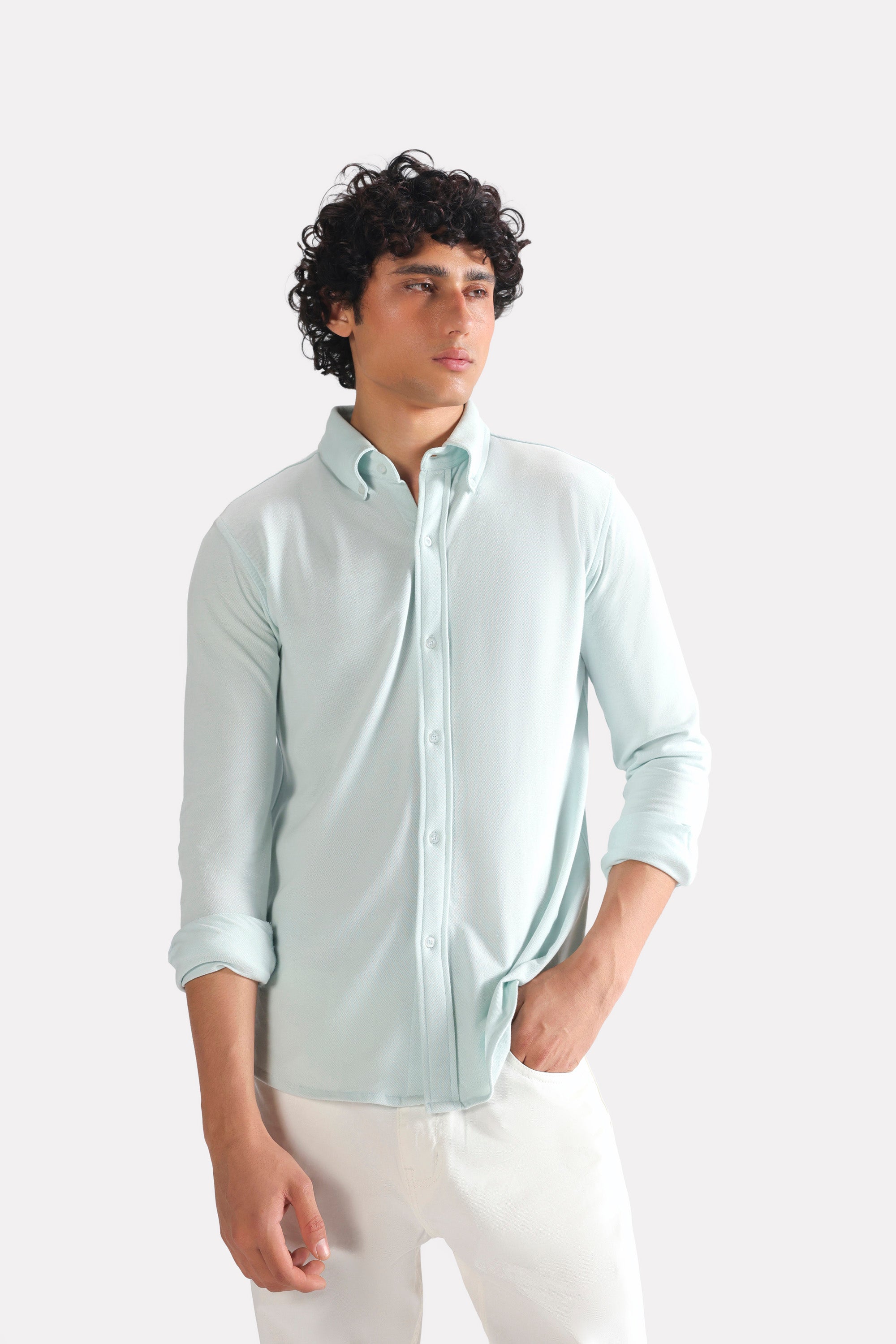 Light blue regular fit pique shirt in cotton, worn by a model, by SOLA Pakistan.