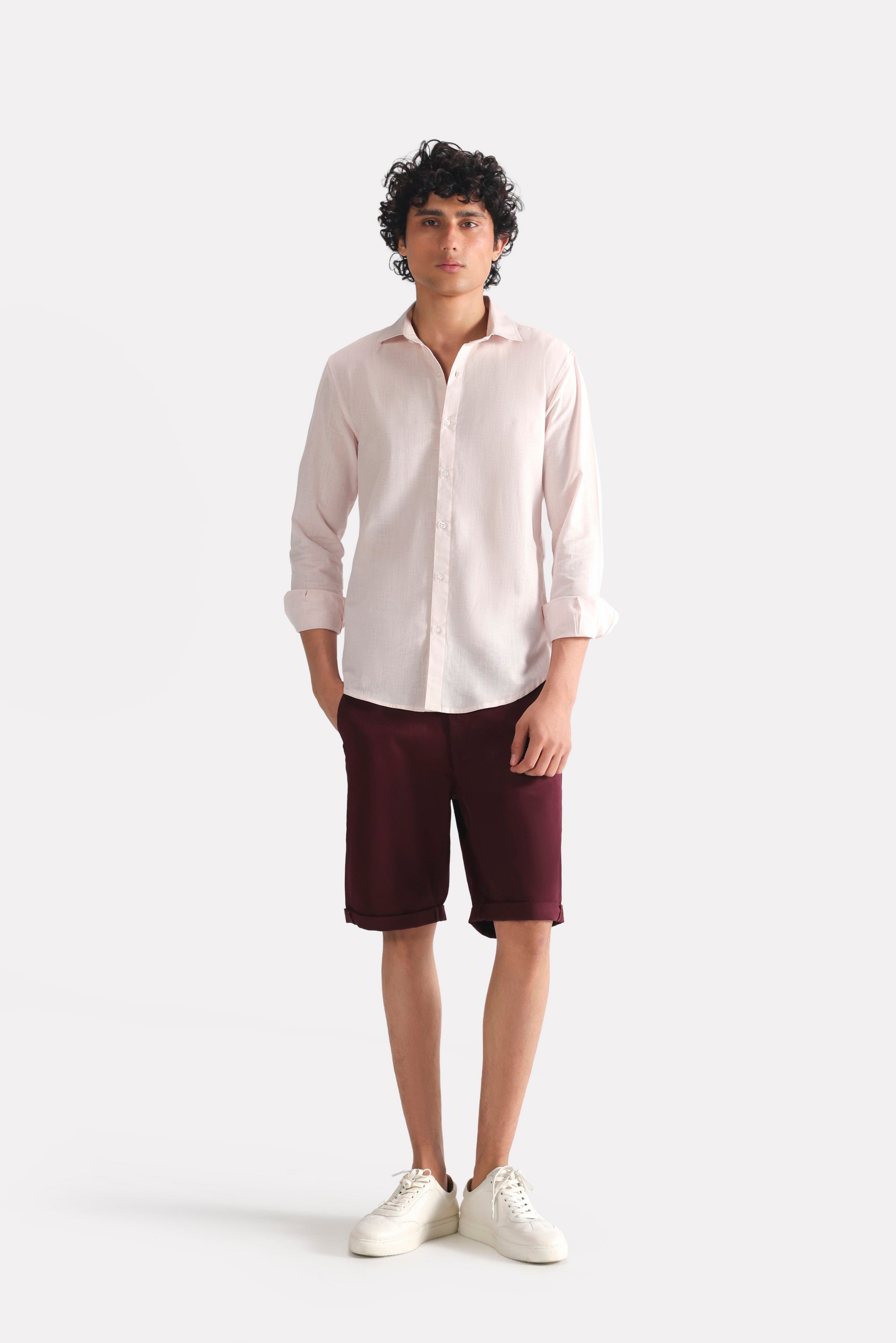 Close-up detail on the light pink relaxed cotline shirt, by SOLA Pakistan.