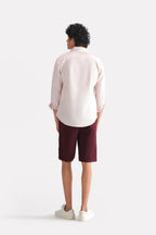 Flat lay of the light pink relaxed cotline shirt, by SOLA Pakistan.