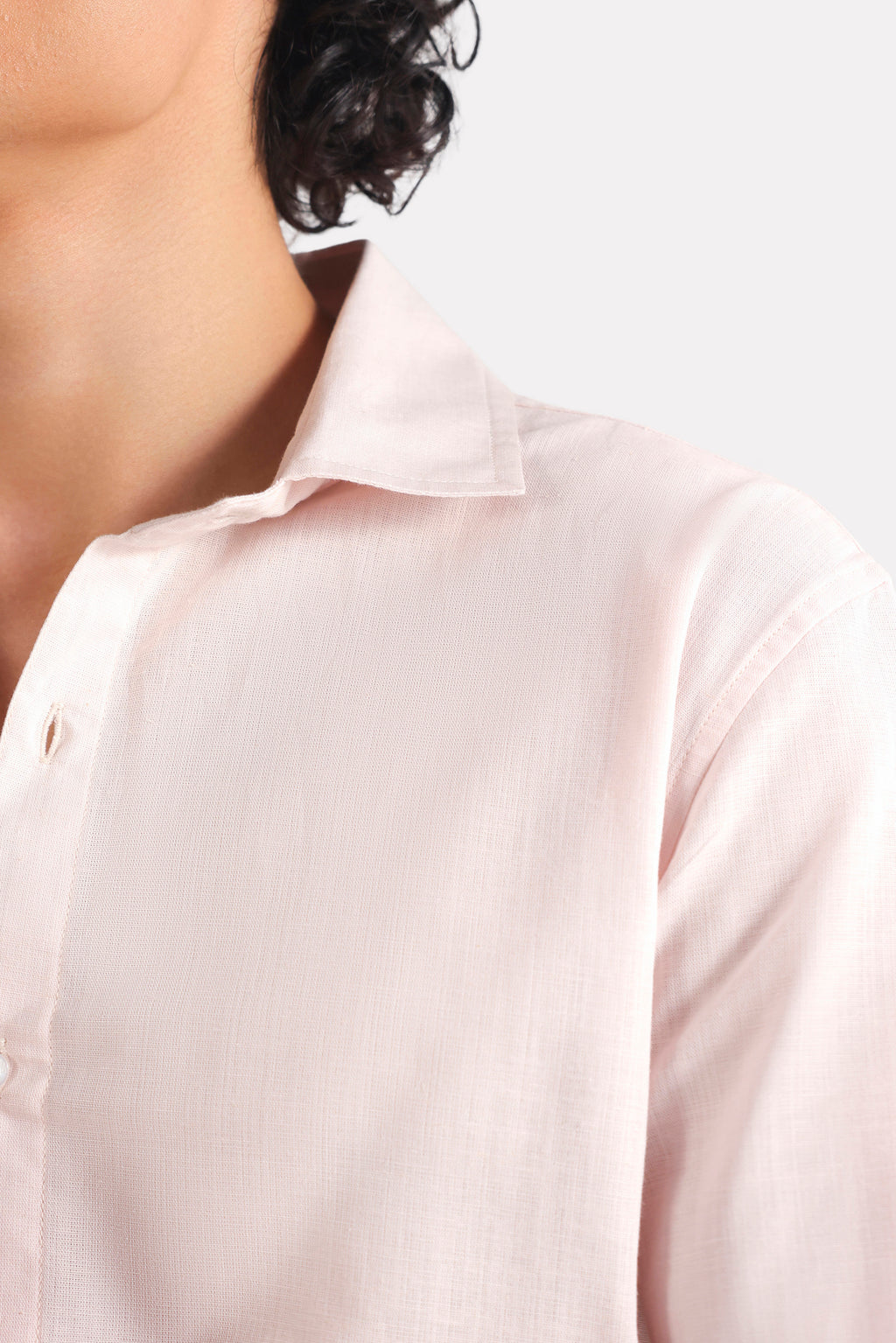 Light pink relaxed cotline shirt shown in a styled fit, by SOLA Pakistan.
