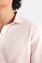 Light pink relaxed cotline shirt shown in a styled fit, by SOLA Pakistan.