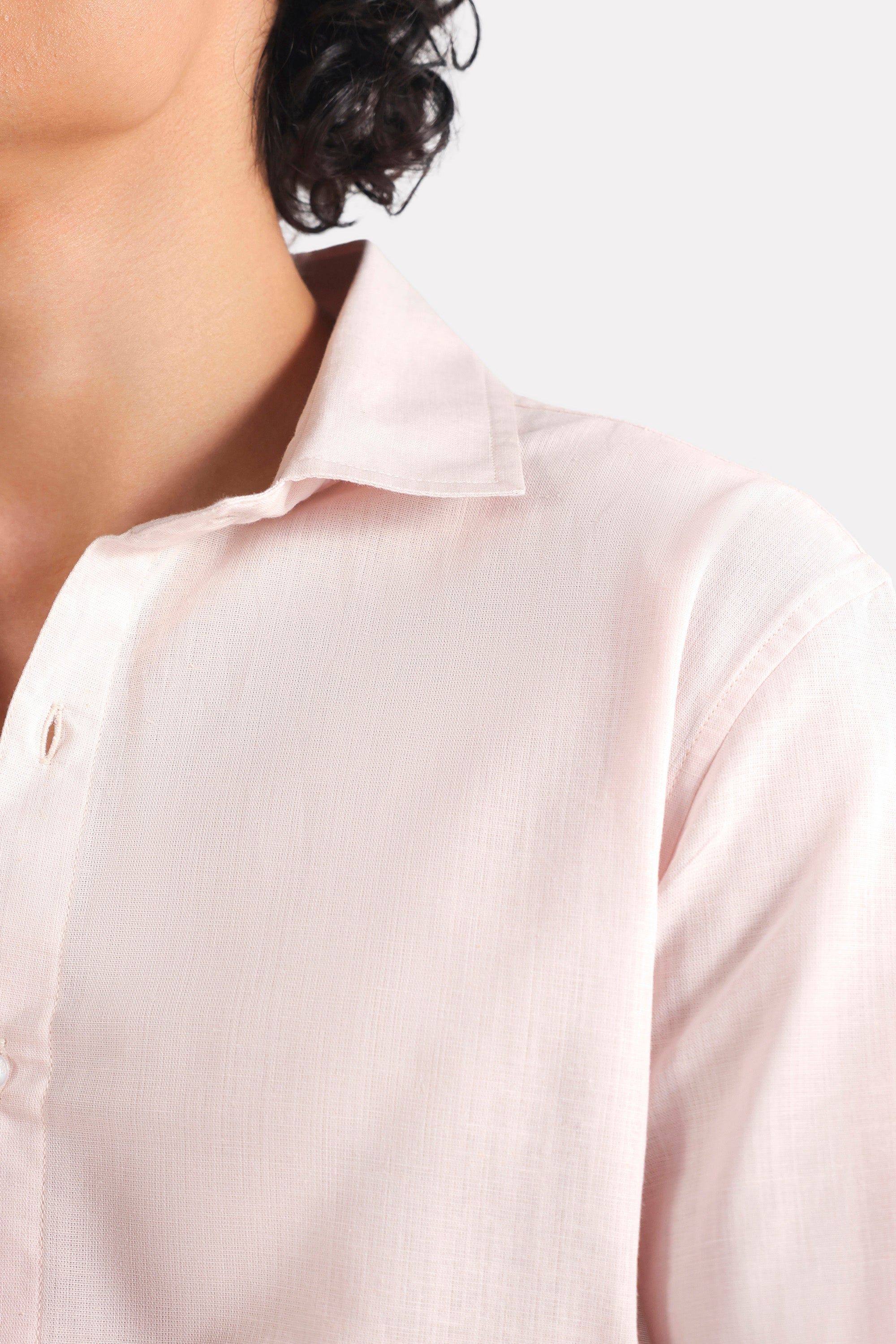 Light pink relaxed cotline shirt shown in a styled fit, by SOLA Pakistan.