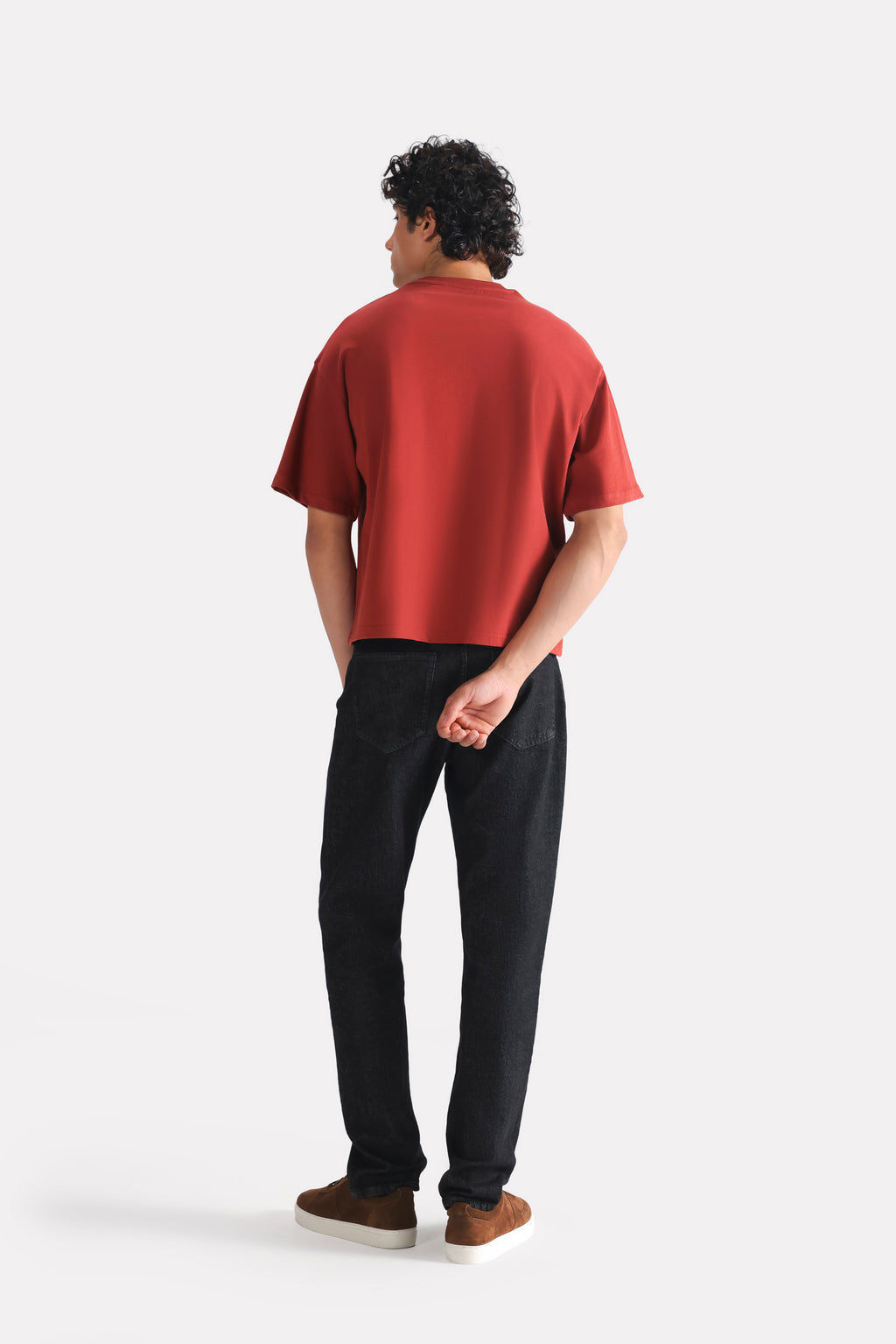 Flat lay of the matt red drop shoulder cotton t-shirt, by SOLA Pakistan.