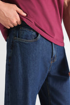 Close-up detail on the mid blue signature regular fit jeans, by SOLA Pakistan.