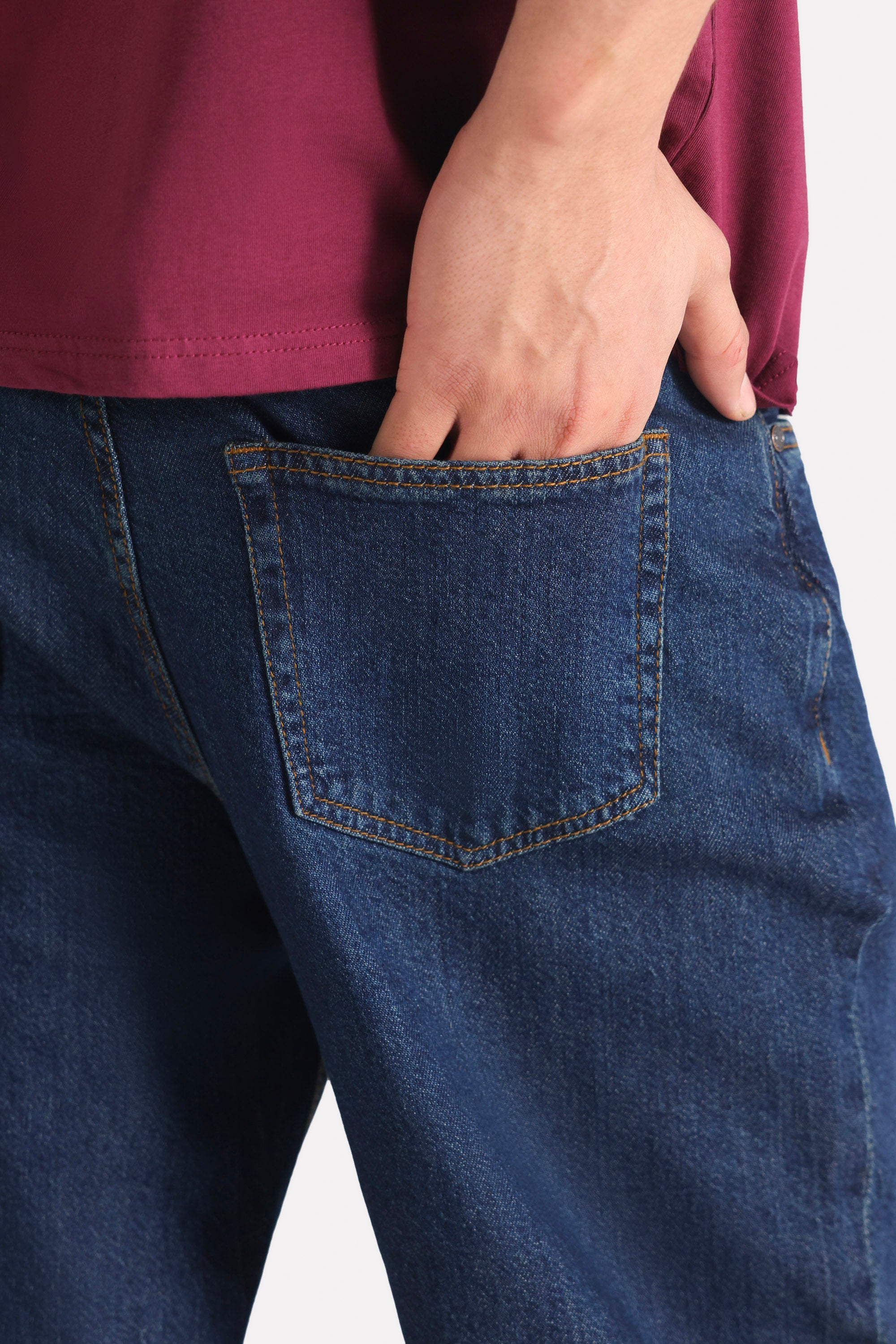 Mid blue signature regular fit jeans shown in a styled fit, by SOLA Pakistan.