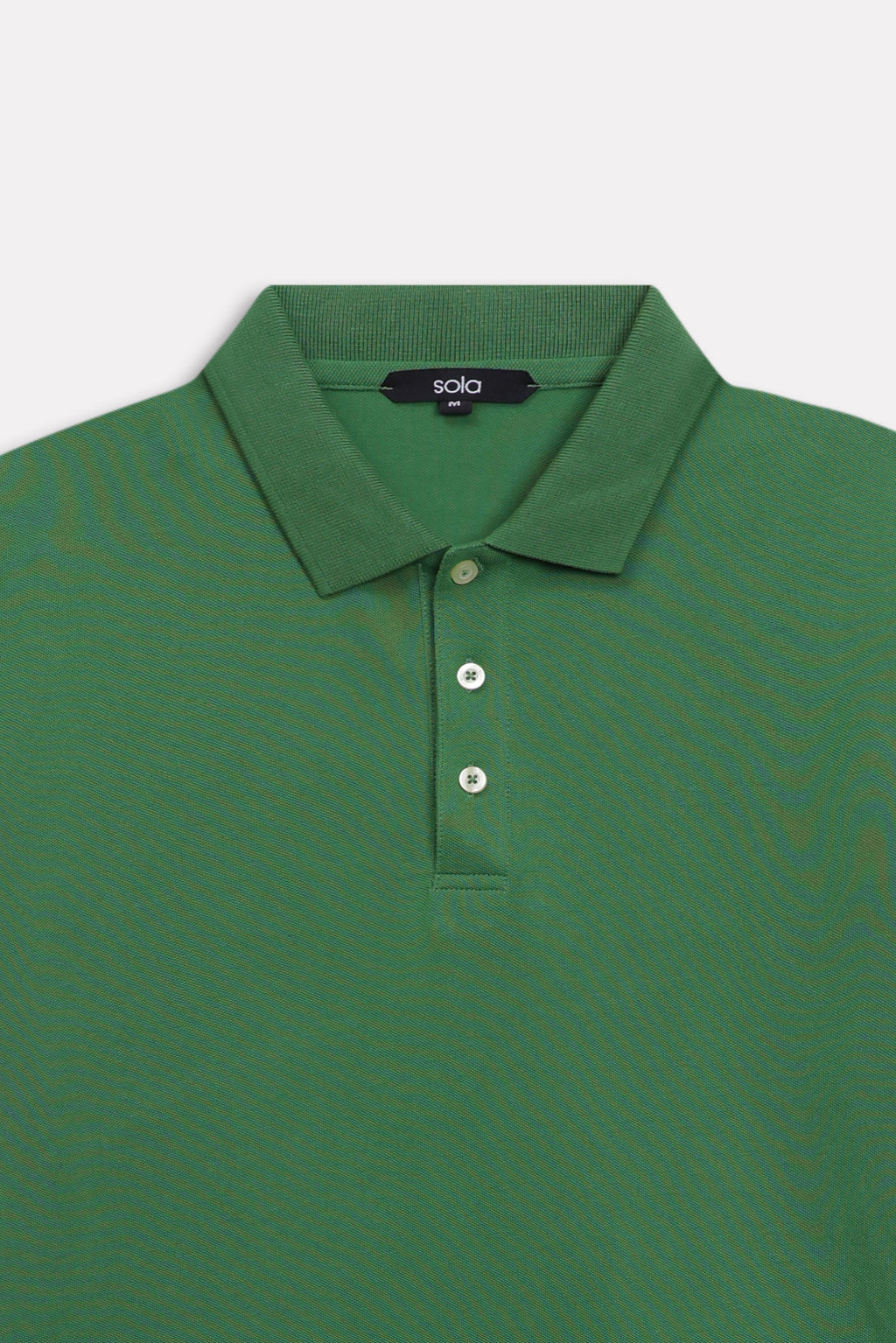 Additional view of the moss green micro-textured cotton pique polo, by SOLA Pakistan.