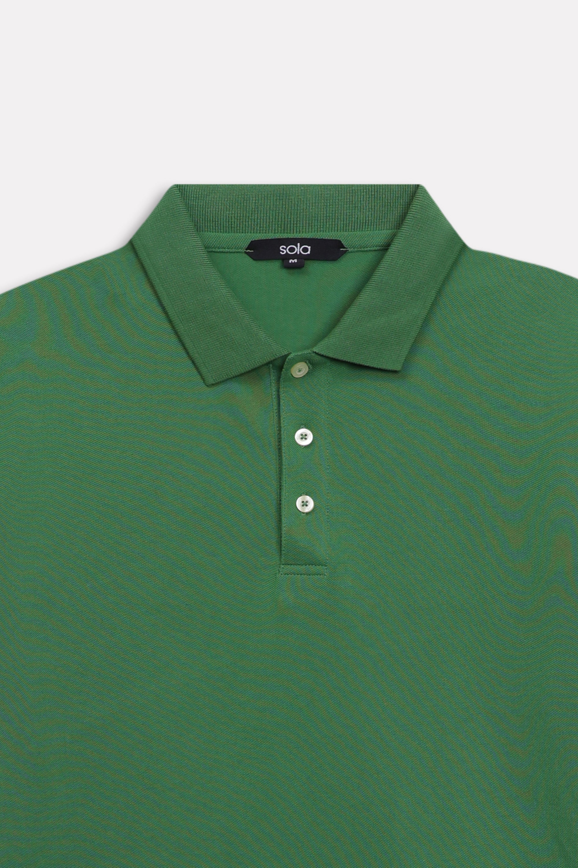 Additional view of the moss green micro-textured cotton pique polo, by SOLA Pakistan.