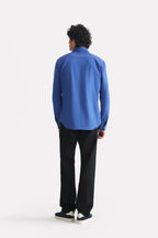 Flat lay of the navy blue relaxed cotline shirt, by SOLA Pakistan.