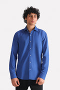 Navy blue relaxed cotline shirt in cotton-linen blend, worn by a model, by SOLA Pakistan.