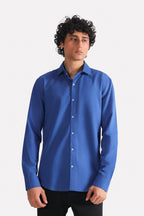 Navy blue relaxed cotline shirt in cotton-linen blend, worn by a model, by SOLA Pakistan.