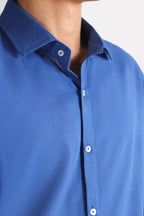 Navy blue relaxed cotline shirt shown in a styled fit, by SOLA Pakistan.