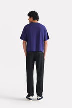 Navy drop shoulder cotton t-shirt shown in a styled fit, by SOLA Pakistan.