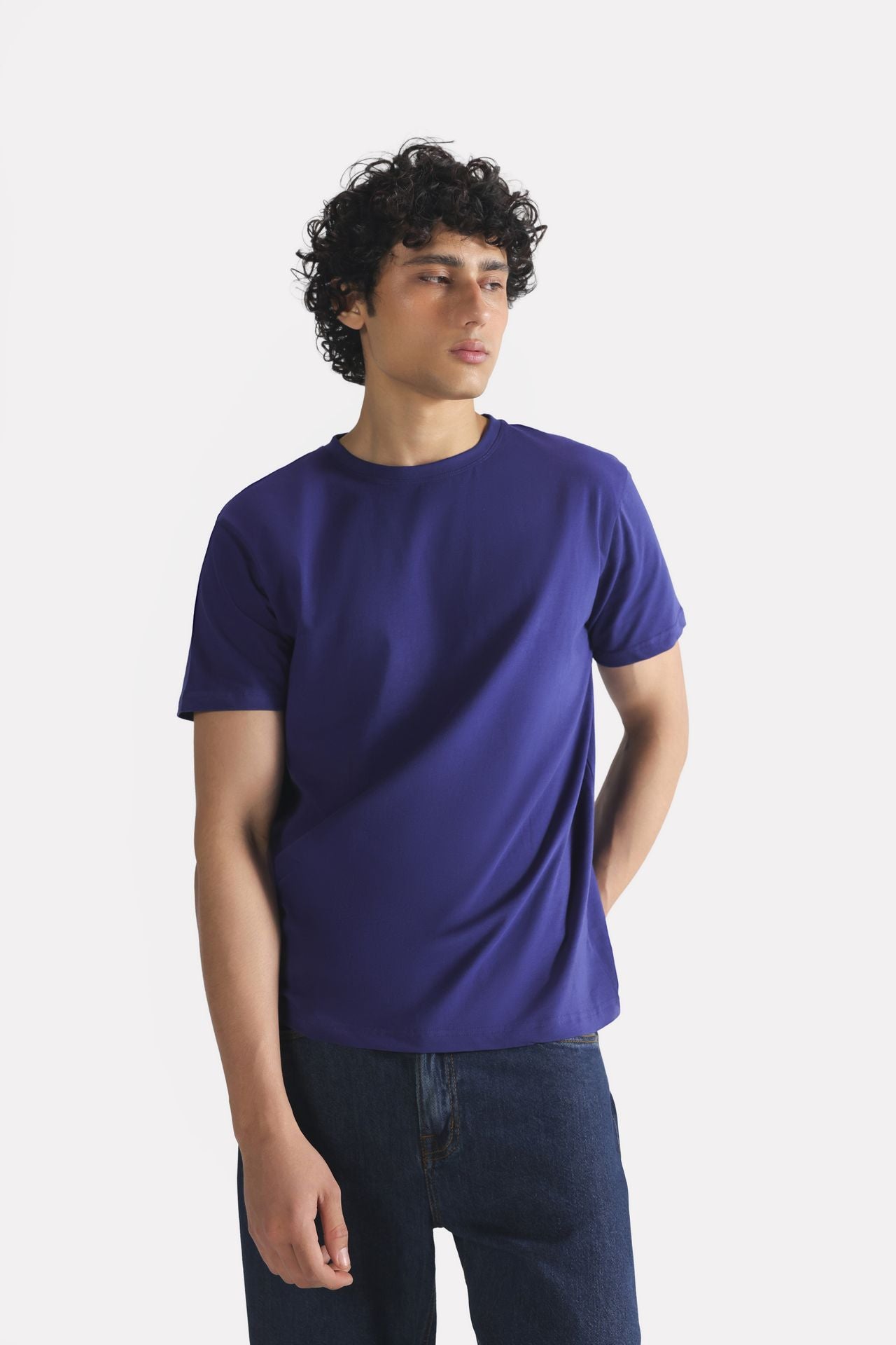 Close-up detail on the navy regular fit crew neck t-shirt, by SOLA Pakistan.