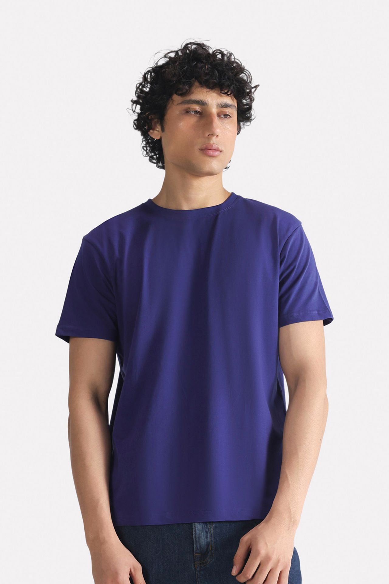 Navy regular fit crew neck t-shirt in cotton, worn by a model, by SOLA Pakistan.