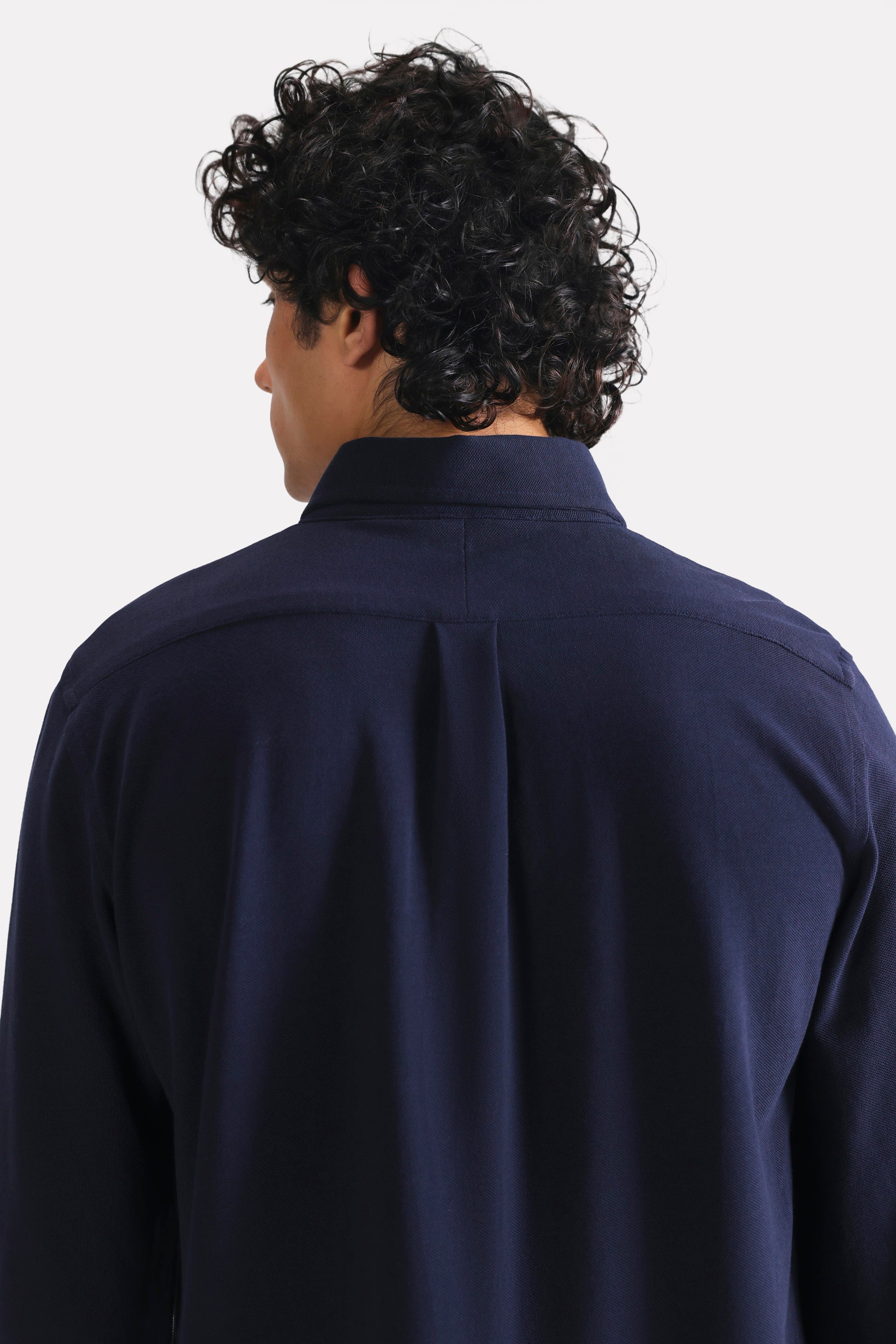 Flat lay of the navy regular fit pique shirt, by SOLA Pakistan.
