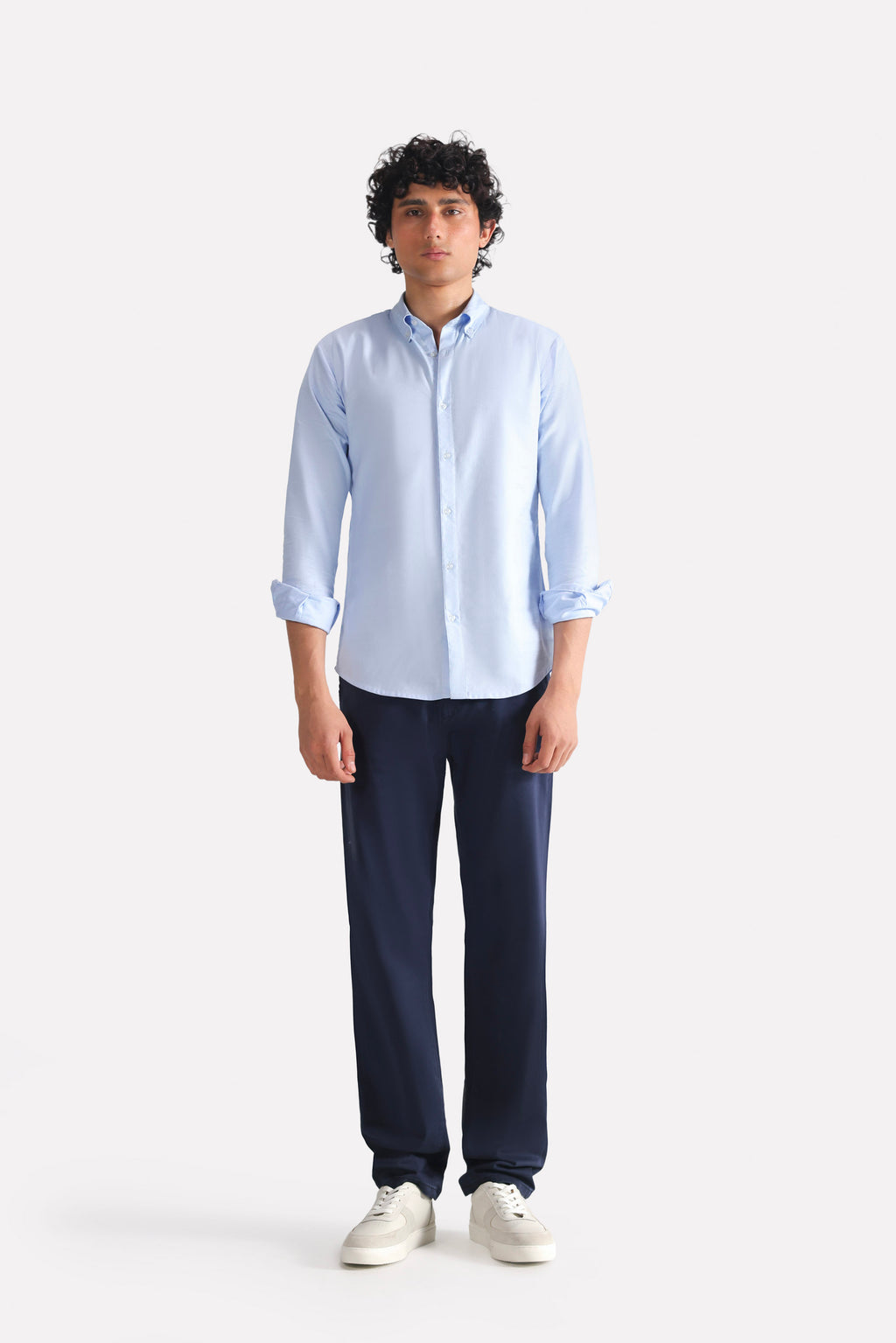 Navy satin straight-fit chino in cotton, worn by a model, by SOLA Pakistan.