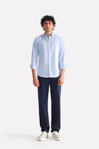 Navy satin straight-fit chino in cotton, worn by a model, by SOLA Pakistan.
