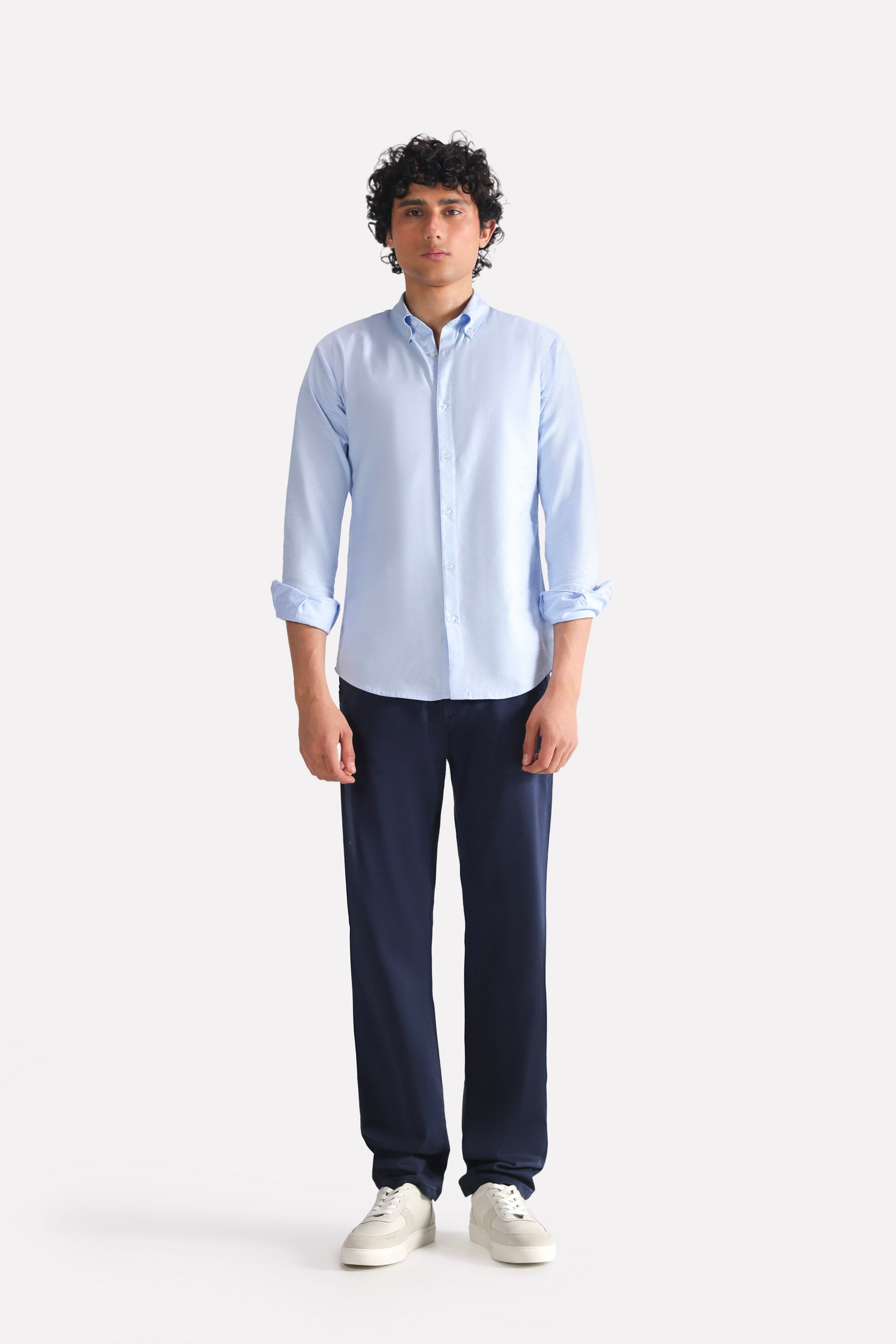 Navy satin straight-fit chino in cotton, worn by a model, by SOLA Pakistan.