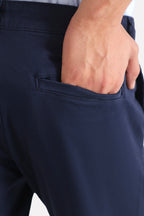 Navy satin straight-fit chino shown in a styled fit, by SOLA Pakistan.
