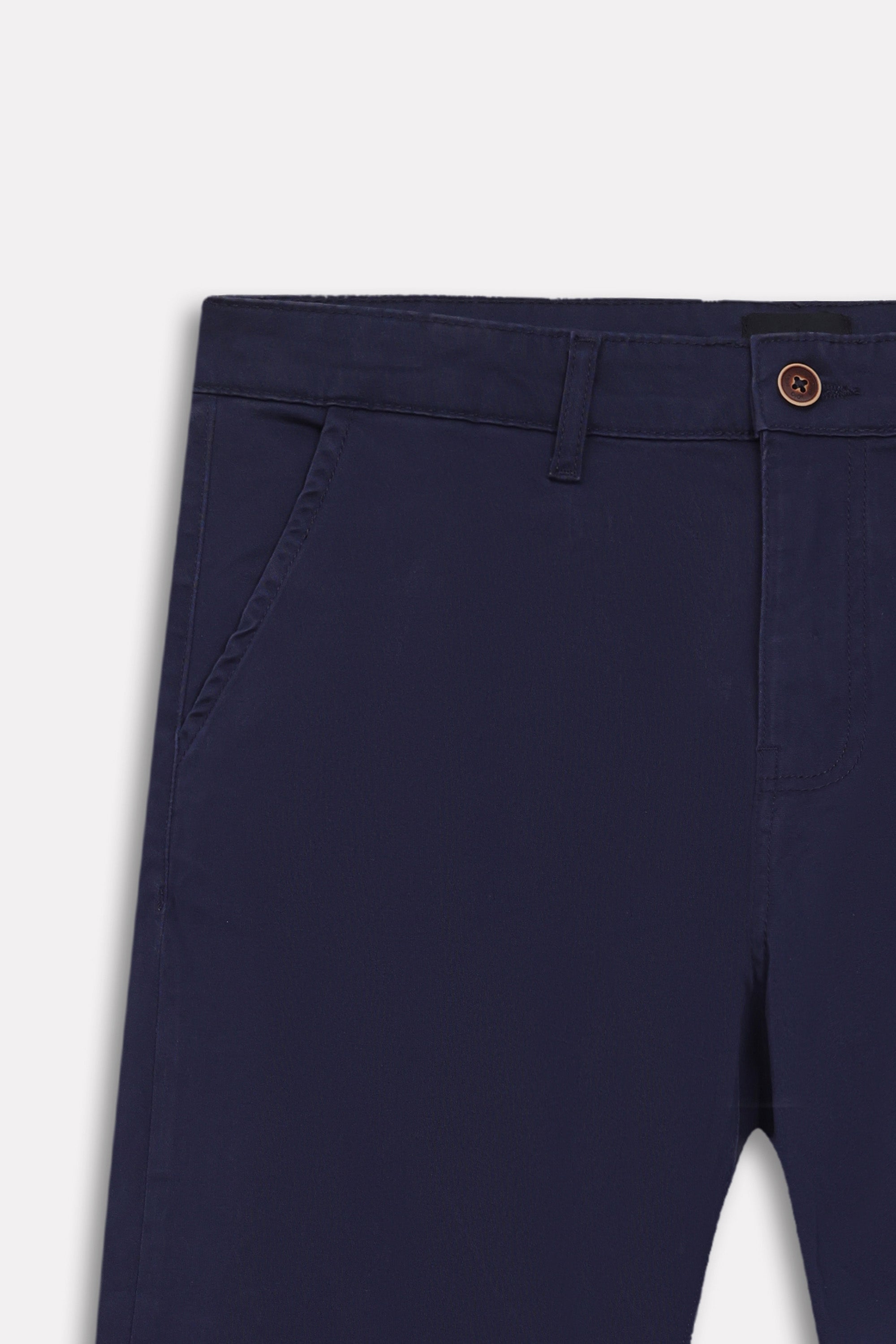 Texture and fabric detail, navy satin straight-fit chino, by SOLA Pakistan.