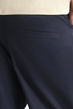 Navy straight fit cotton trouser shown in a styled fit, by SOLA Pakistan.
