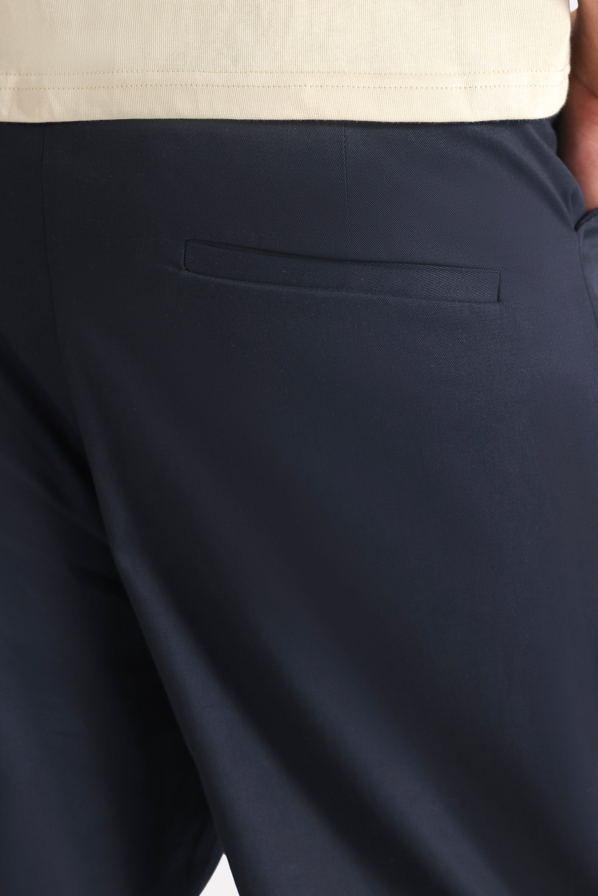 Navy straight fit cotton trouser shown in a styled fit, by SOLA Pakistan.