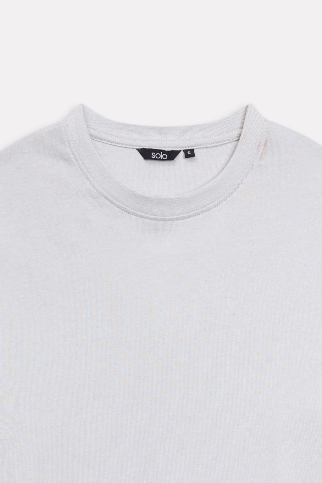 Additional view of the off-white (cloud dancer) drop shoulder cotton t-shirt, by SOLA Pakistan.