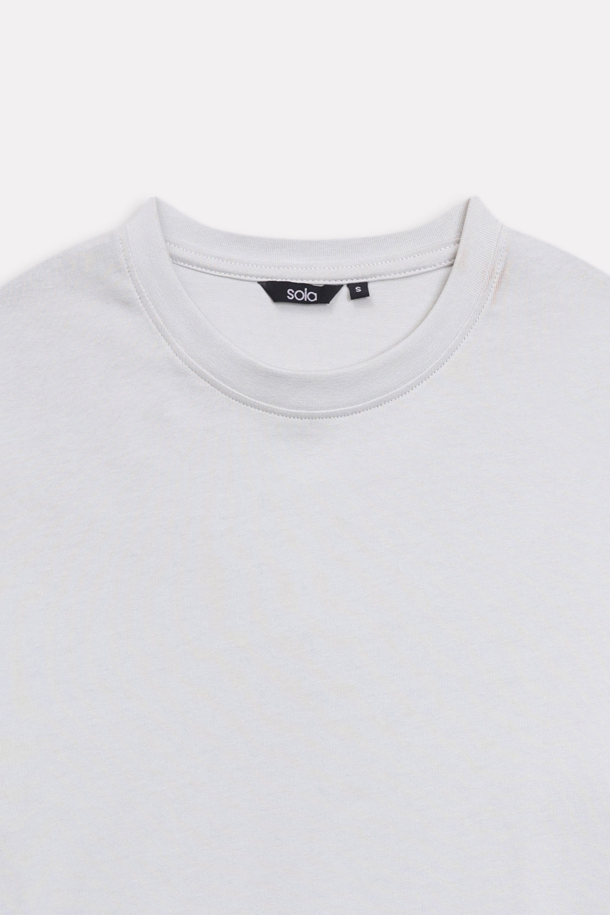 Additional view of the off-white (cloud dancer) drop shoulder cotton t-shirt, by SOLA Pakistan.