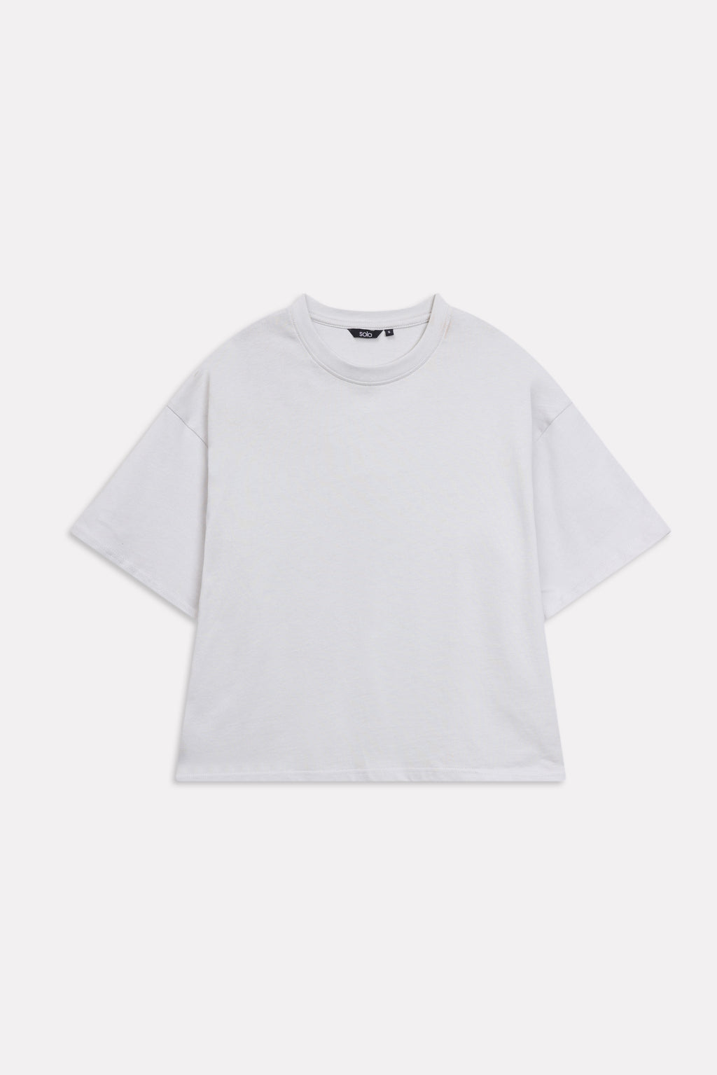 Off-white (cloud dancer) drop shoulder cotton t-shirt, alternate angle, by SOLA Pakistan.