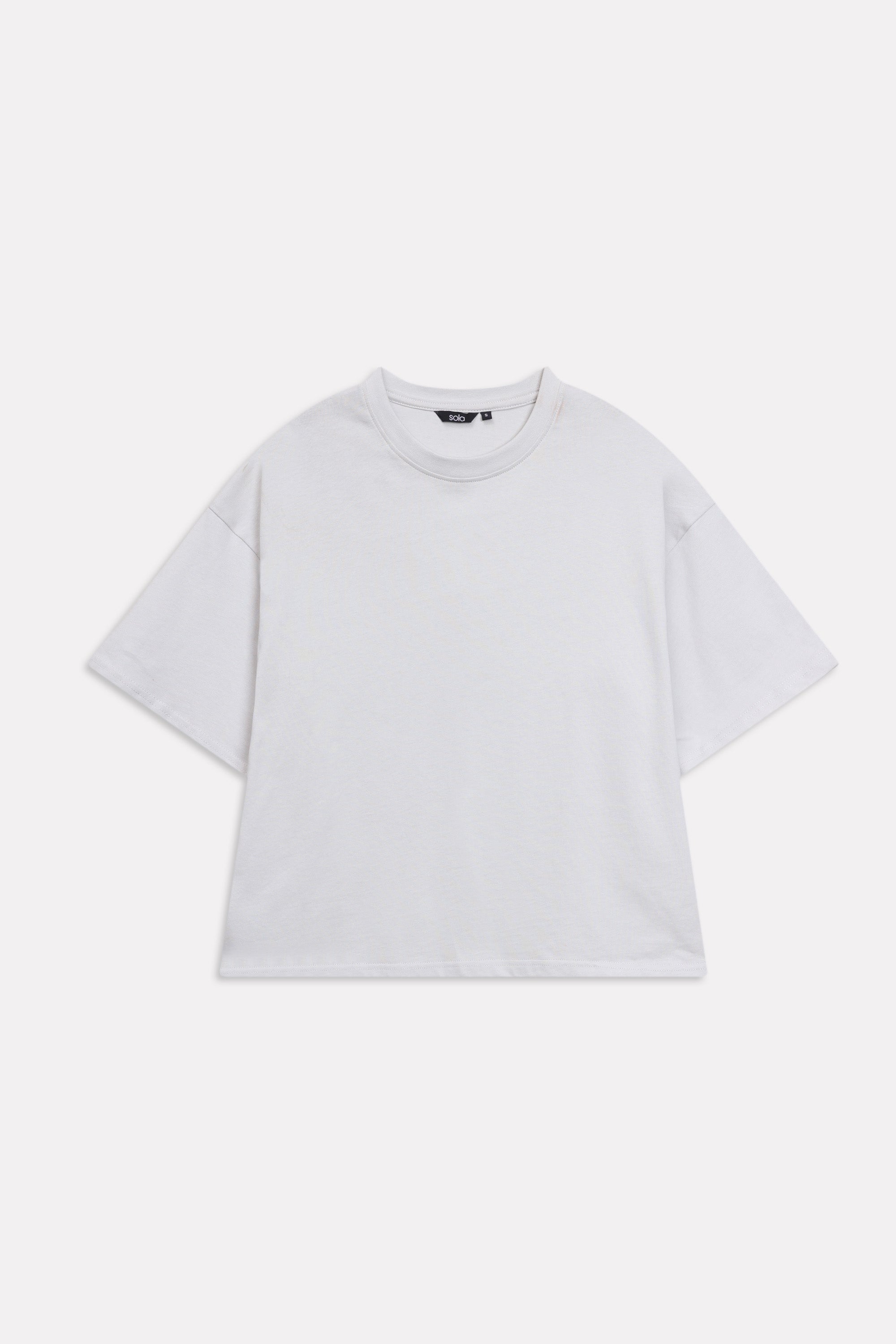 Off-white (cloud dancer) drop shoulder cotton t-shirt, alternate angle, by SOLA Pakistan.