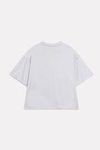 Texture and fabric detail, off-white (cloud dancer) drop shoulder cotton t-shirt, by SOLA Pakistan.